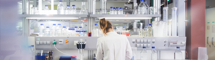 woman at a bench in a lab