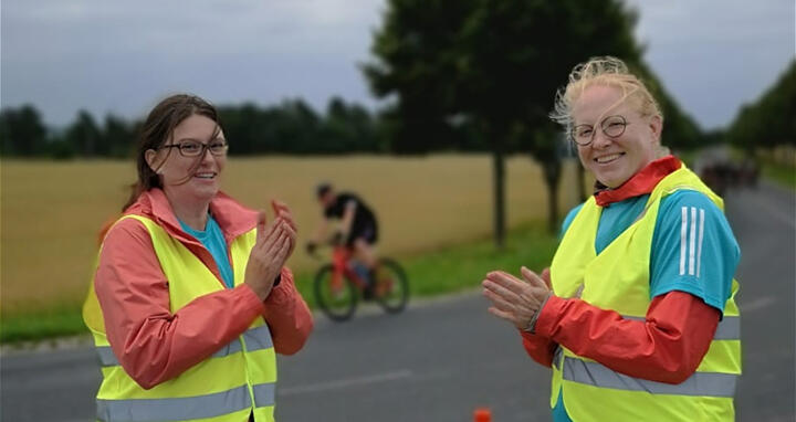 two women at a sports track
