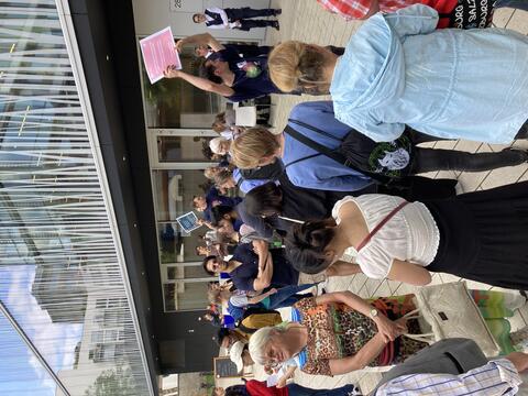 People in front of a research building