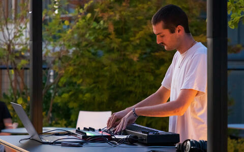 DJ at the desk