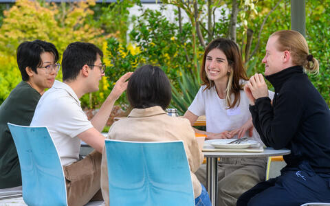 group of people discussing at a table