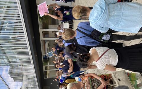 People in front of a research building