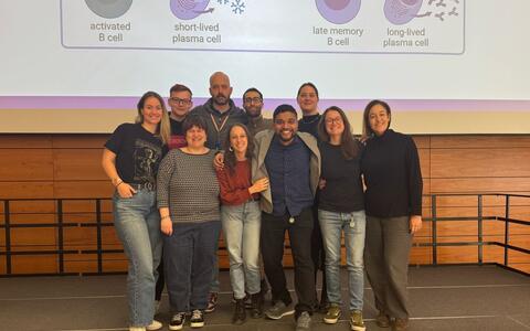 The group poses for a photo after the 2025 Di Virgilio / Kolesnichenko symposium