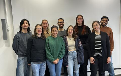 The lab poses for a group pictures before the Christmas festivities begin
