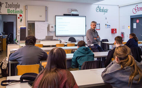 Mitch Gotthardt in front of a class