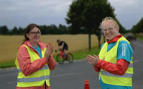 two women at a sports track
