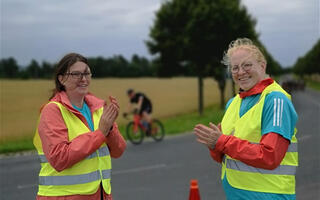 two women at a sports track
