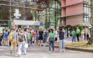 People in front of a building