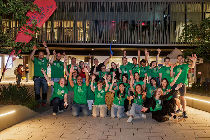 group of people cheering